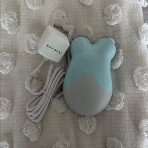 NuFACE Mini Microcurrent Facial Device in Mint and Gray with Charger